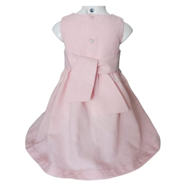 13 Robe rose 2 ans avec des petits plis horizontaux et des petites fleurs devant